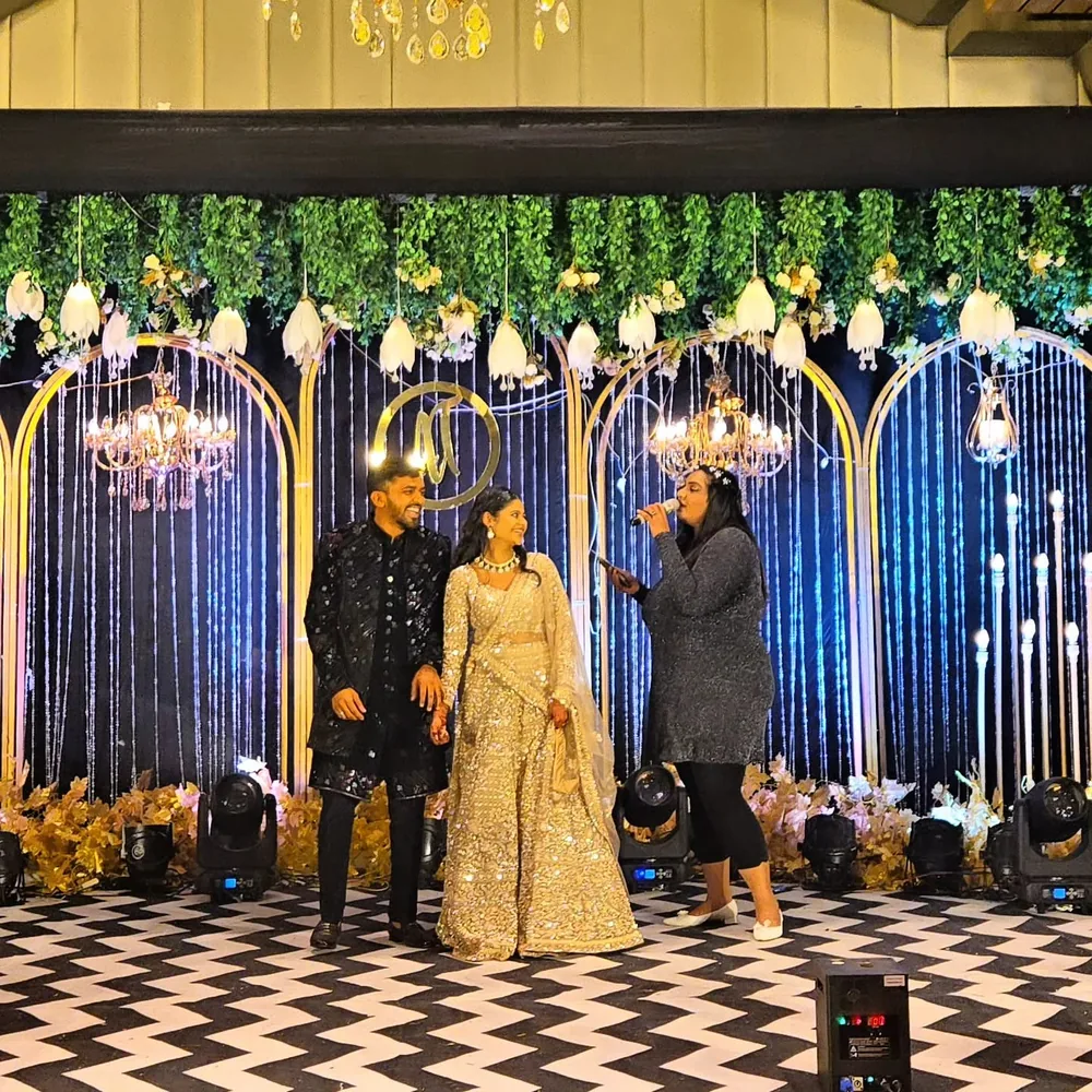 Wedding anchor in Pune with bride and groom