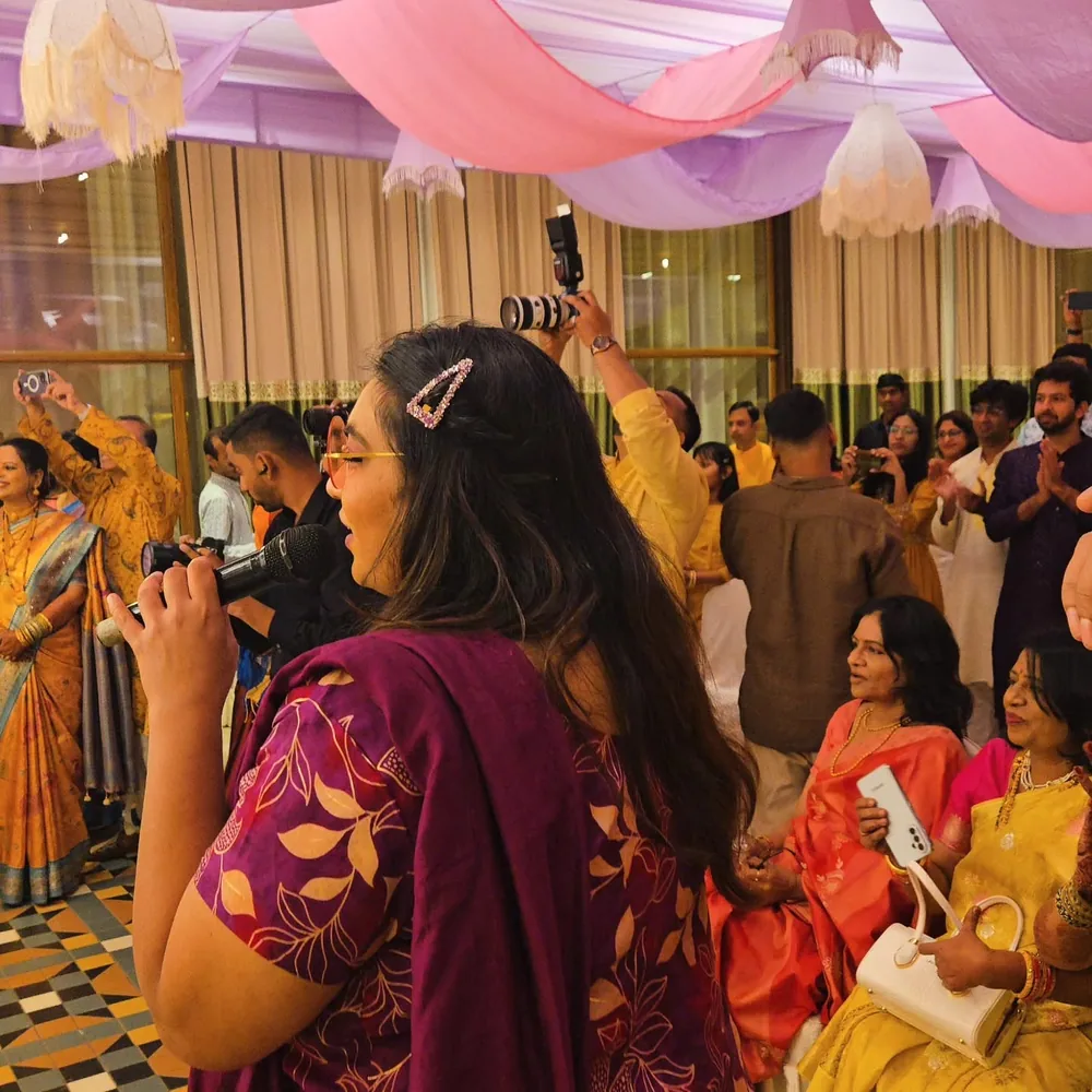 Wedding anchor in Pune hosting a Haldi ceremony